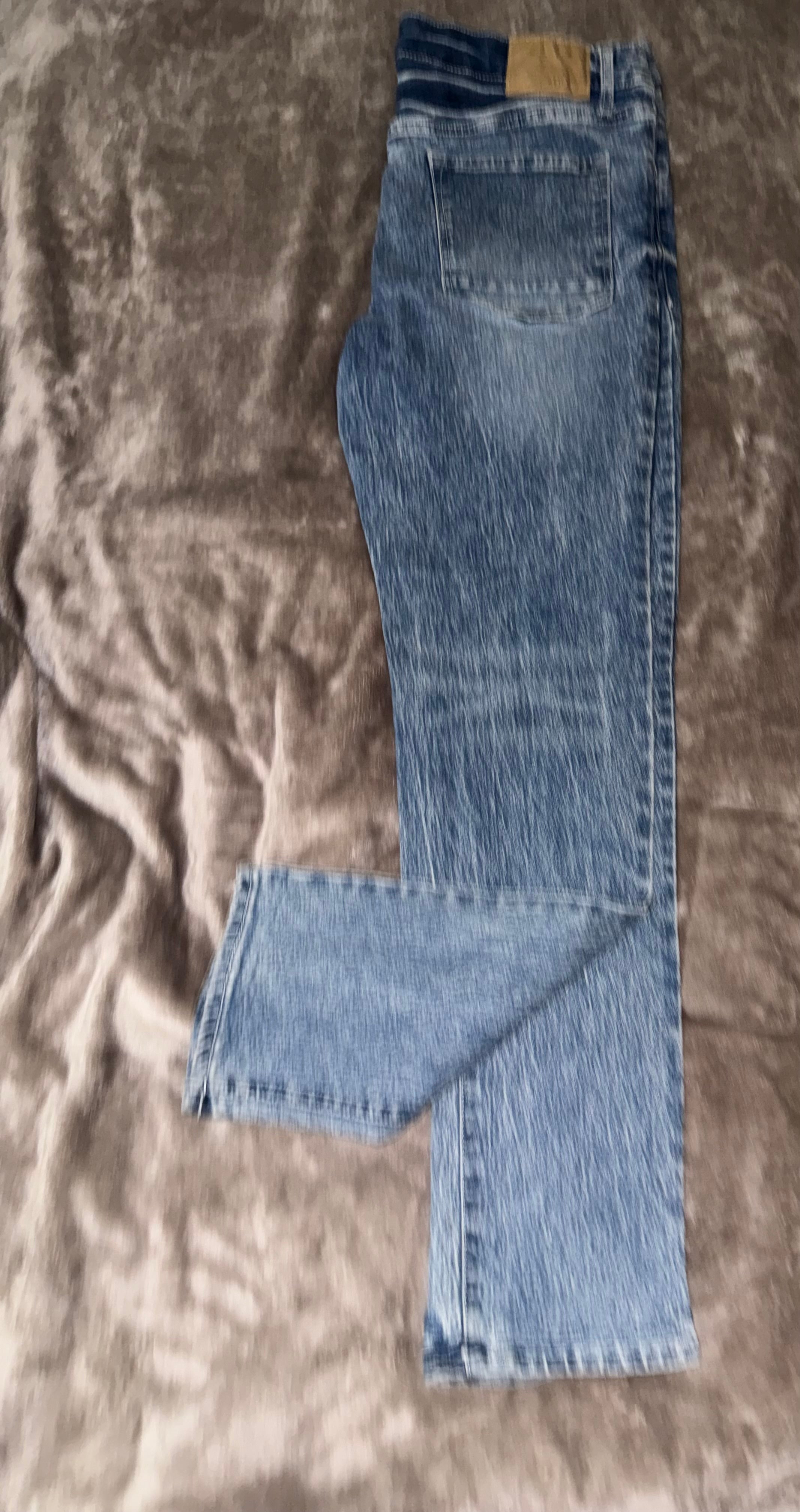 One of a kind!! Classic slightly worn blue acid wash jeans. Urban wear, party wear, or everywhere